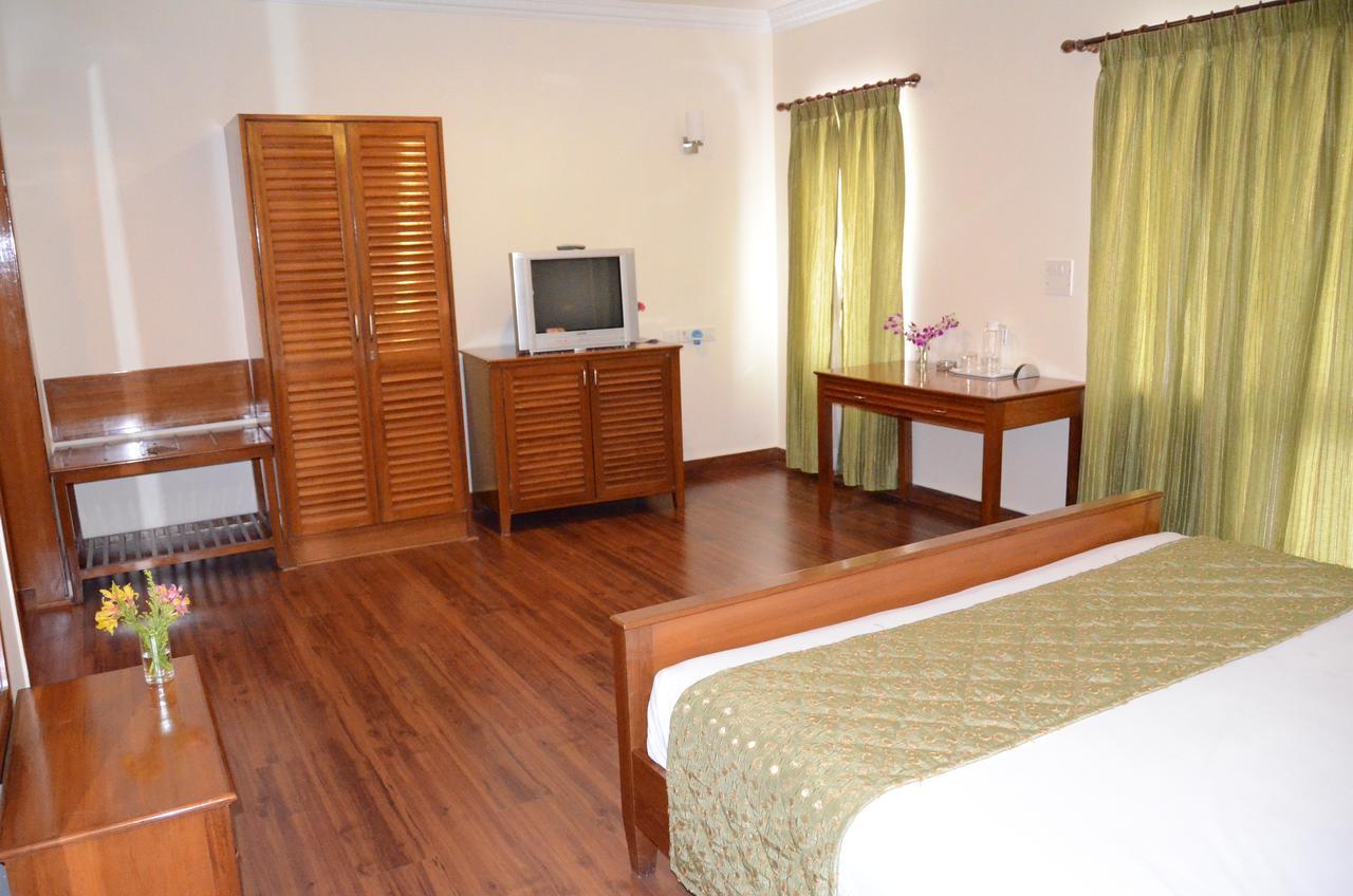 Trinity Suits Bangalore Esterno foto